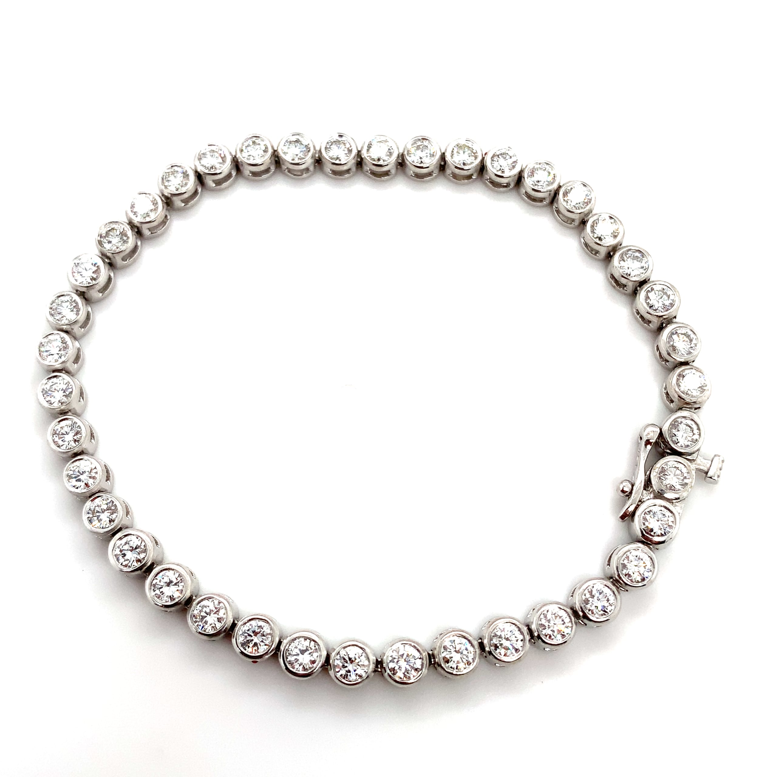 Diamond tennis bracelet bezel rubover 18k white gold