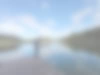 Lac de Barterand, a fishing and bathing lake near the Manoir du Colombier in the Ain department.