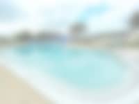 A&E GEST'AGENCY | Piscine | Escaliers | Arbres | Ciel | Nuages ​​| Clôture | Hébergement
