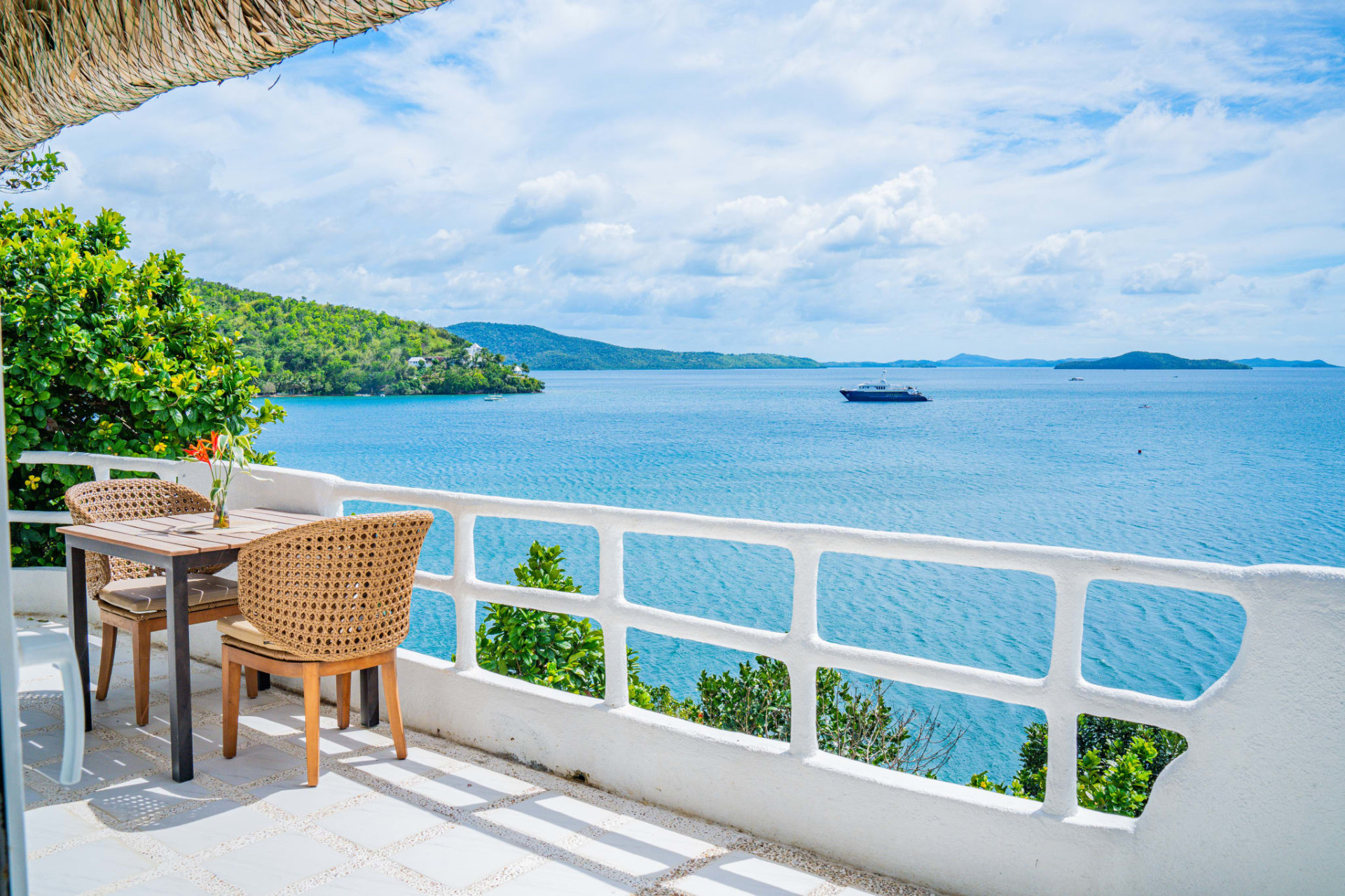 View of the coastline and ocean from a balcony