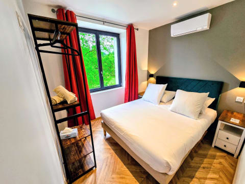 Chambre double avec penderie et climatisation
