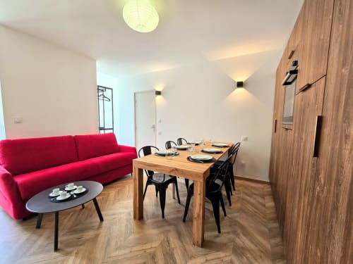 Salon et coin repas de l’appartement 3 Vindihouses