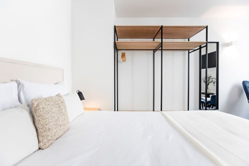 Superior Studio bedroom at Benefit Collection hotel in Porto with modern canopy bed and wardrobe