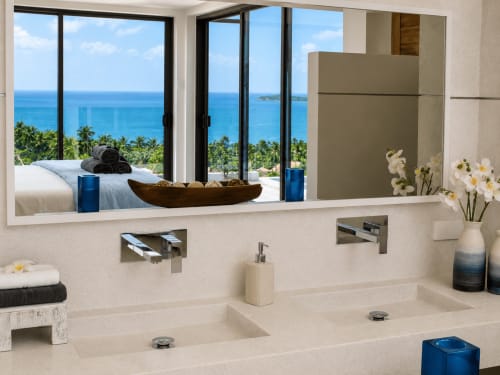 Luxury bathroom with dual sinks overlooking tropical sea view and palm trees at Indigo Villa Samui, Ko Samui