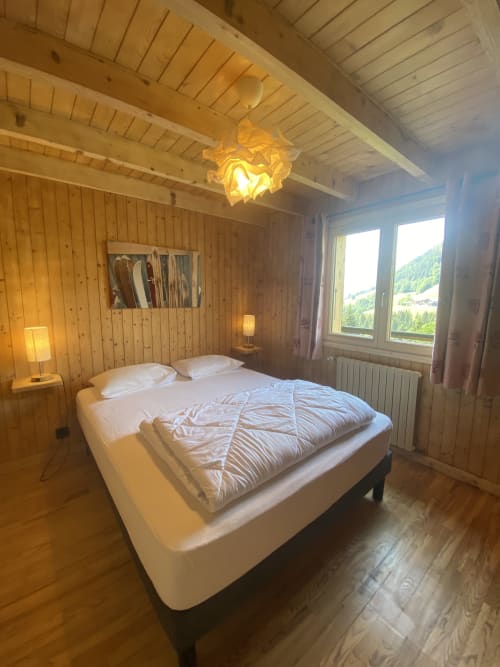 Cozy wooden bedroom with mountain views at La Ferme des Georgières, Notre-Dame-de-Bellecombe