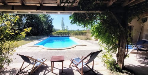 Swimming pool with loungers and pergola at Les Gites de Campardon cottage in Monties, France