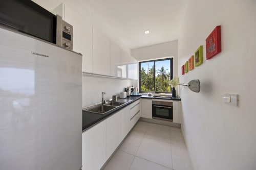 Kitchen with appliances and a beautiful view | Experience Breathtaking Sea Views at Villa Indigo