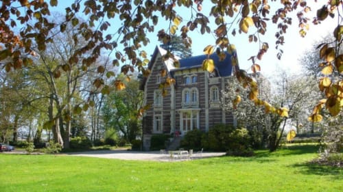 Chalet Du Bel Event - Victorian brick mansion set in landscaped grounds with autumn foliage in La Chapelle-sur-Dun, France