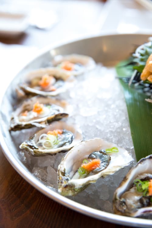 Fresh oysters with garnish served at Chalet Du Bel Event, a French bed and breakfast in La Chapelle-sur-Dun