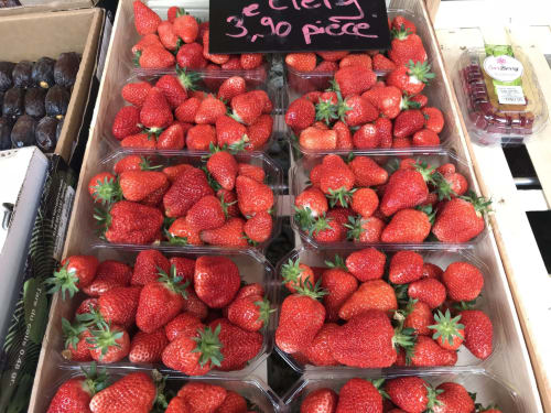 Fresh red strawberries displayed at Manoir De Rieuzal market in Loubressac, France