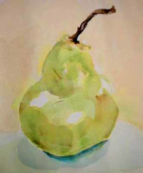 Fresh green pear with stem at Manoir De Rieuzal, a charming bed and breakfast in Loubressac, France