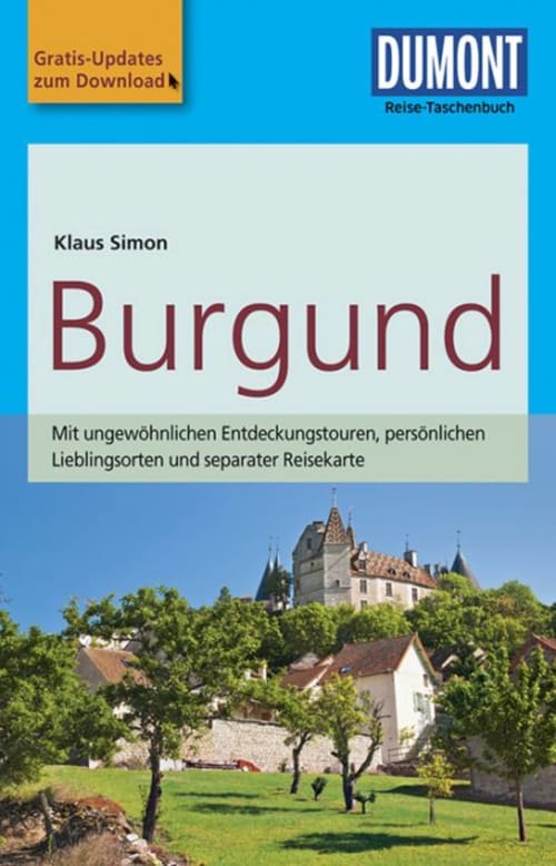 Bourgondië reisgids van Klaus Simon met middeleeuws kasteel met torens omgeven door groen landschap nabij Autun, Frankrijk
