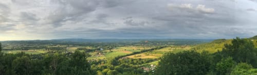 Panoramic view of Loubressac valley and countryside from Manoir De Rieuzal, French rural landscape with rolling hills