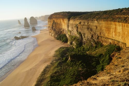 Dramatic golden cliffs and sea stacks at Twelve Apostles, Victoria coast near St Martins