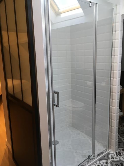 Modern glass shower enclosure in Annex King Room at Le château d'Hermonville, Hermonville, France