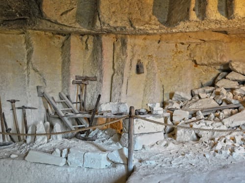 Historic stone quarry tools and materials at Les gîtes des châteaux, Vallières-les-Grandes