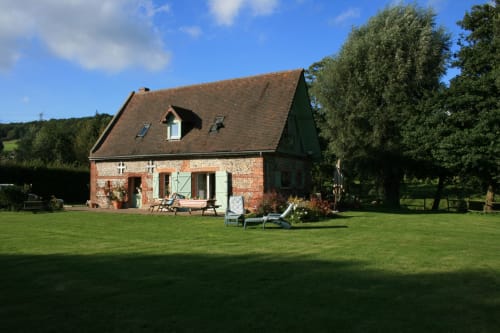 La Bouverie cottage at La Chatellenie in Saint Aubin le Cauf, France with river views and manicured lawn