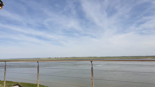 Vue de la baie de Somme depuis le balcon du cottage Vue D'ici, Saint-Valéry-sur-Somme, avec panorama marin et paysage côtier