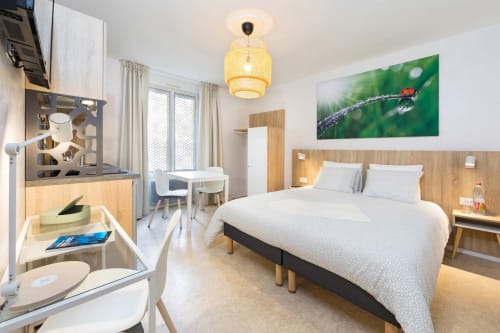 Studio à Un Air De Famille à Vittel avec lits jumeaux, kitchenette et équipements modernes