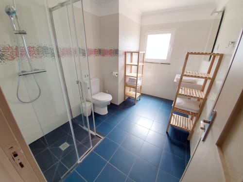 Bathroom 1 in the villa for rent Casa Claudina located in the heart of a 5000m² property, this lovely 210m² villa is ideally located just 2.5 km from the AQUASHOW water park which is the largest in the Algarve and at 18 KM from Faro airport. Villa rental near vilamoura for your holidays, your events, parties or groups up to 20 people. Rental villa with large wooden terrace for 16 people and large heated swimming pool located in the Algarve in Portugal in Loule. At the heart of a 5000m² property, this lovely 210m² villa is ideally located just 2.5 km from the AQUASHOW water park which is the largest in the Algarve and 18 km from Faro airport. Come and practice your favorite leisure activities within a radius of 20 minutes maximum, enjoy the most beautiful golden sand beaches "Vale do Lobo", "Forte Novo Beach", "Praia da Oura", Vilamoura and Quarteira, of the karting circuit in Almancil, from Vilamoura marina and first class golf courses "Vila Sol Golf", "Quinta do Lago Laranjal Golf Course", "royal de Vale do Lobo - Ocean Golf Course".