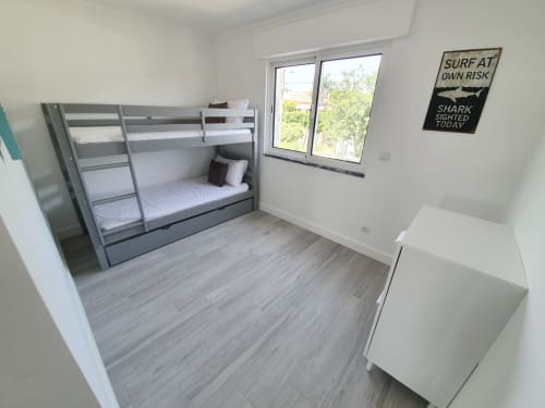 Bedroom 7 with 1 bunk bed in the rental villa Casa Claudina located in the heart of a 5000m² property, this lovely 210m² villa is ideally located just 2.5 km from the AQUASHOW water park which is the largest in the Algarve and 18 KM from Faro airport. Villa rental near vilamoura for your holidays, your events, parties or groups up to 20 people.