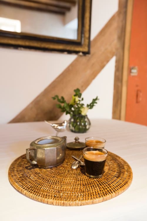Coffee service at Clos Saint Jacques B&B in Meursault, France with espresso cups and teapot on woven tray