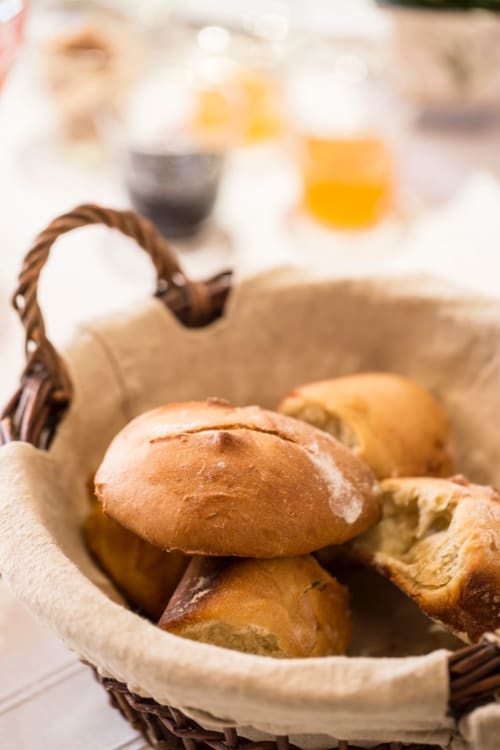 Basket of fresh bread rolls at Clos Saint Jacques breakfast, Meursault France bed and breakfast