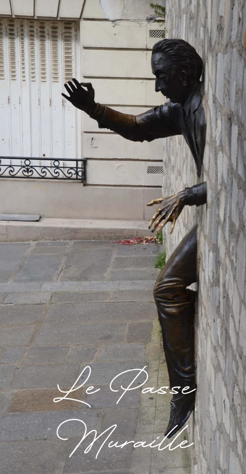 Le Passé Muraille bronze sculpture in Montmartre Paris, iconic street art near romantic bed & breakfast