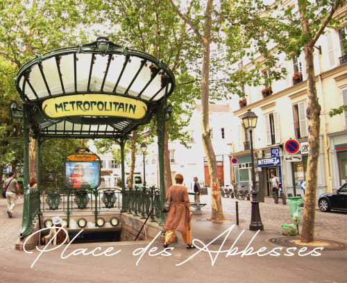 Iconic Art Deco Métropolitain entrance at Place des Abbesses, Paris Montmartre