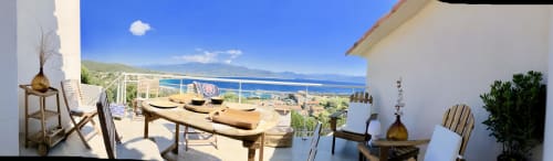 Casa Felice villa terrace overlooking Mediterranean Sea, Corsica with loungers and sea views
