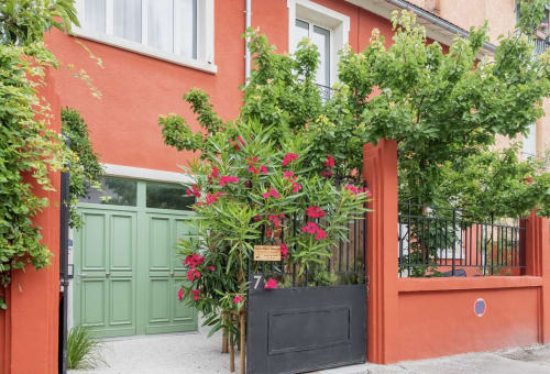 Red facade of the house