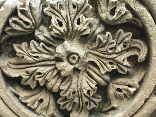 Ornate stone carved rosette detail at Le château d'Hermonville, a French bed and breakfast in Hermonville
