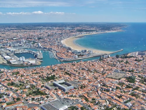 Aerial view of Les Sables-d'Olonne beach, marina, and coastal town in France