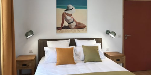 Lit double. Appartement Le Gambetta. Centre Ville. Location d'appartements de tourisme. Appartements. La Rochelle.