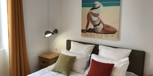 Lit double. Appartement Le porte royale. Centre Ville. Location d'appartements de tourisme. Appartements. La Rochelle.