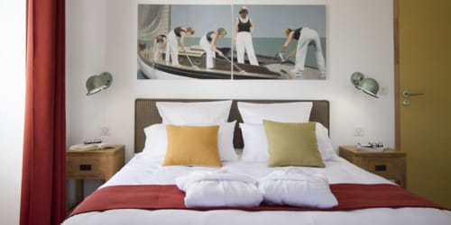 lit double. Studio Saint Louis. Centre Ville. Location d'appartements de tourisme. Appartements. La Rochelle.