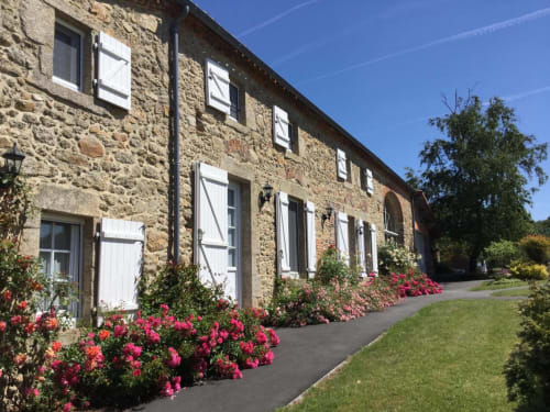 guest rooms-view of south facade-reception-beautiful flowers-garden with heated pool