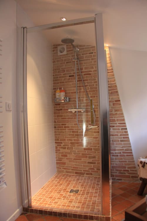Shower with mosaic floor