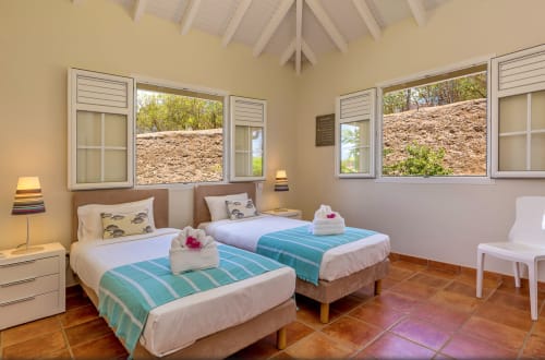 La chambre d'enfant de la Villa Azura et ses lits jumeaux. Votre location saisonnire au Vauclin, Martinique