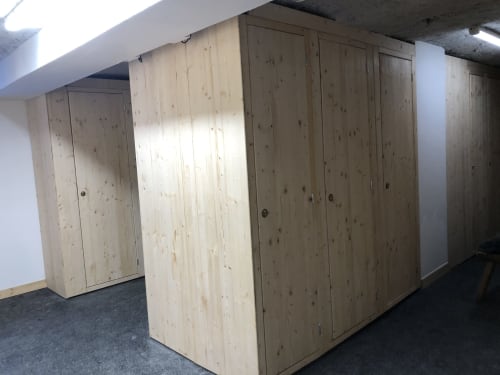 Wooden storage cabinets in Le Champenois apartment at Le château d'Hermonville, Hermonville