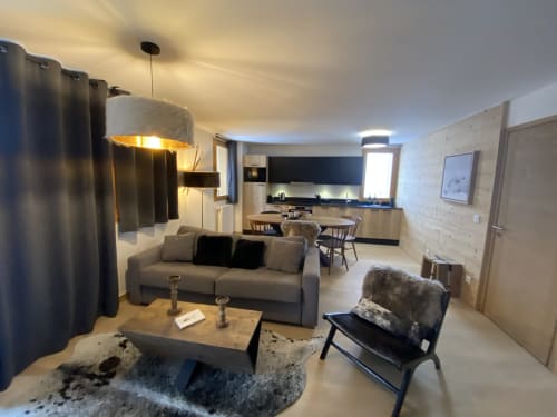 Modern guest suite at Le château d'Hermonville BnB in Hermonville with comfortable seating, dining area, and contemporary