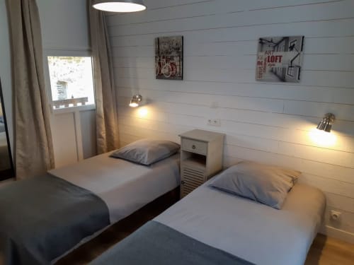 La chambre “enfants” du Lodge avec 2 lits simples