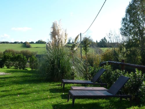 Jardin ouvert sur champs normands