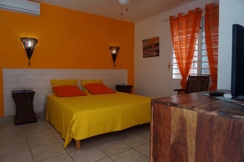 Chambre chaleureuse - Villa en Guadeloupe