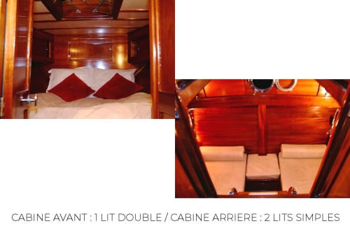 Intérieurs luxueux du gîte Banyuls : lit double avec coussins rouges et deux couchettes avec éclairage ambiant