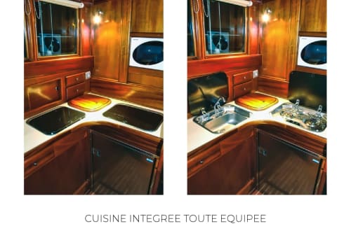 Kitchenette entièrement équipée du gîte de Banyuls-sur-Mer : meubles en bois, double évier et électroménagers modernes
