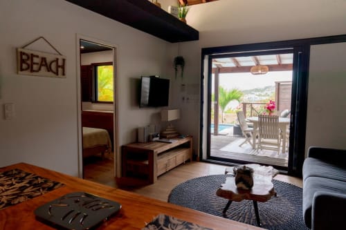 salon avec cuisine - vacances aux Antilles 