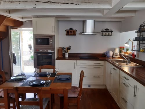séjour cuisine équipée Gite La Bicoque