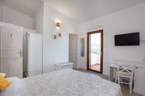 Camera matrimoniale con balcone e vista mare | Affittacamere La casa in collina - San Teodoro (Sardegna)