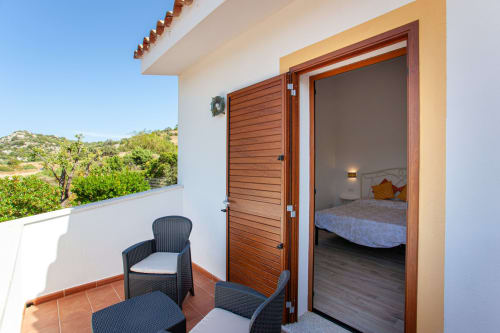 Camera matrimoniale con balcone e vista mare | Affittacamere La casa in collina - San Teodoro (Sardegna)